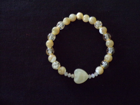 Cream bracelet with heart