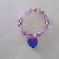 Purple/gold bracelet with heart