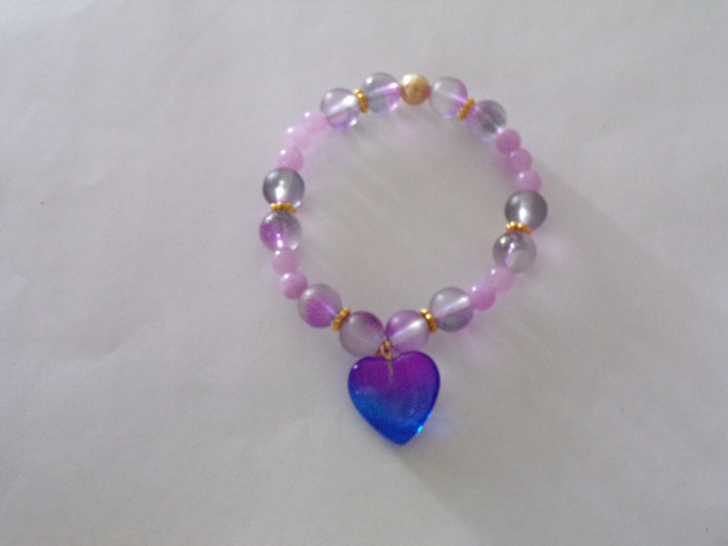 Purple/gold bracelet with heart