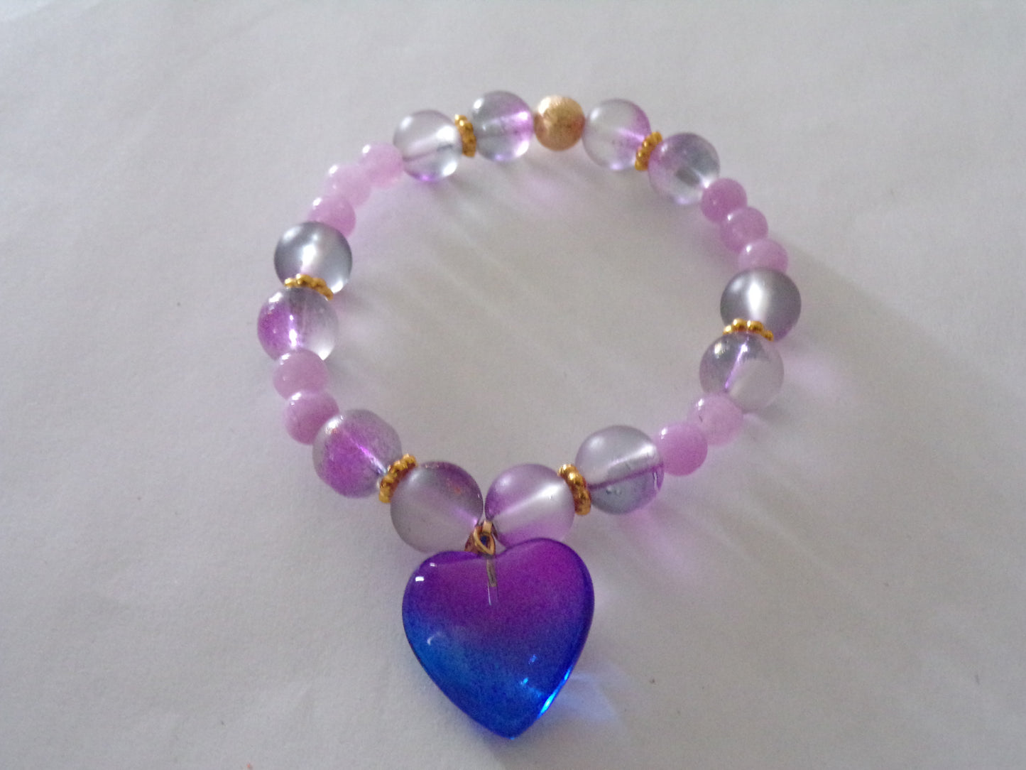 Purple/gold bracelet with heart