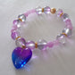 Purple/gold bracelet with heart