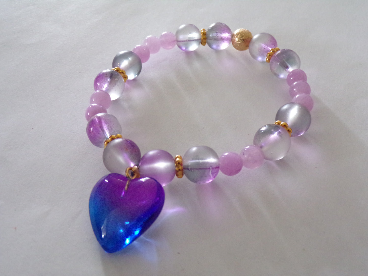 Purple/gold bracelet with heart