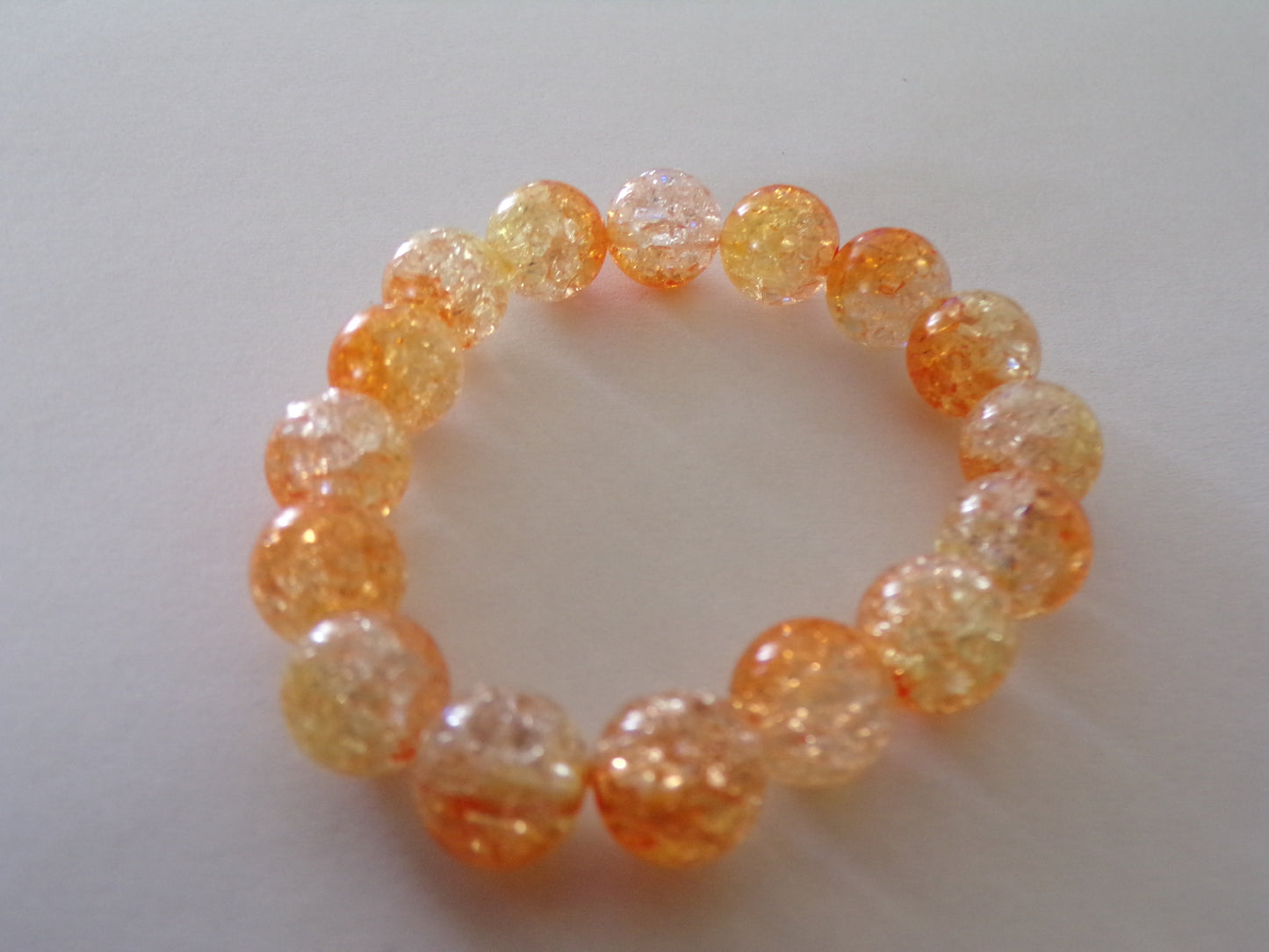 Toddler's orange bracelet